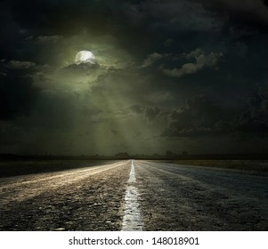 Dramatic sky over an asphalt road - Powered by Shutterstock