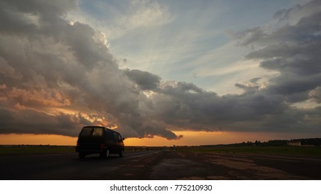Dramatic sky over an asphalt road