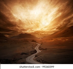 Dramatic sky over road in a valley. - Powered by Shutterstock