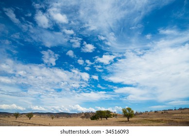 Dramatic Sky over summer rural landscape