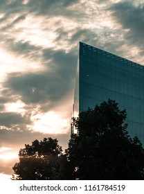 Dramatic sky over triangle building