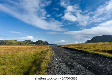 Dramatic Sky And Road In The Icelandic Mountains / South Central Iceland 