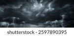 Dramatic sky with storm clouds before rain. Panoramic view of the stormy sky and dark clouds.  Concept on the theme of weather, natural disasters.