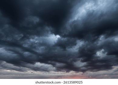 Dramatic sky with storm clouds before rain. Panoramic view of the stormy sky and dark clouds.  Concept on the theme of weather, natural disasters. - Powered by Shutterstock - Get 15% off with code: PIKWIZARD15