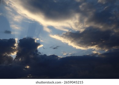 Dramatic sky with sun rays.