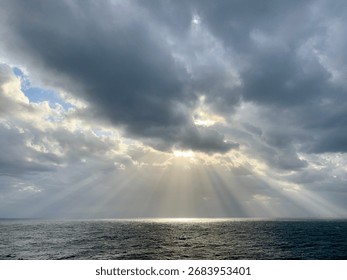 Dramatic Sky with Sun Rays over the Sea