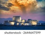 Dramatic sky sunset over the castle Bourtzi in Nafplio