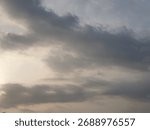 Dramatic Sky with Wispy Clouds During Dusk Evokes a Sense of Serenity and Wonder
