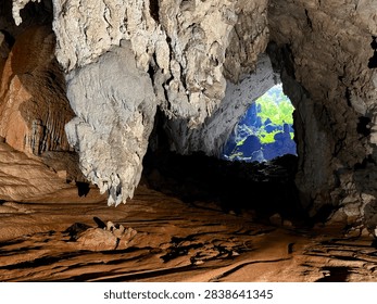 Dramatic skylit chambers deep inside Son Doong Cave during a trekking expedition in Phong Nha-Ke Bang National Park, Vietnam
