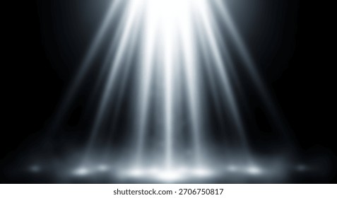 Dramatic spotlight illuminates stage or surface against a dark backdrop.