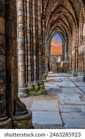 Dramatic stone work and archways in Holyrood Abbey, Edinburgh, Scotland.