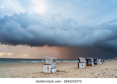 A dramatic storm cloud over the North Sea beach in Westerland. Sylt, Germany