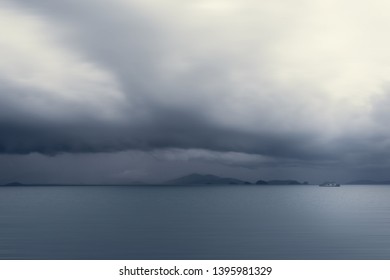 Dramatic storm cloud over the sea, natural photo background.