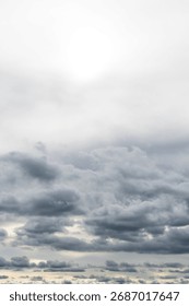 Dramatic storm clouds for the background. Isolated summer storm clouds before a thunderstorm. Dark storm clouds before the rain. Bad weather. A heavenly landscape of clouds in the sky on a rainy day.