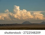Dramatic storm clouds bring thunder and lightning in a New Mexico desert landscape