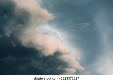 Dramatic storm clouds fill a moody sky