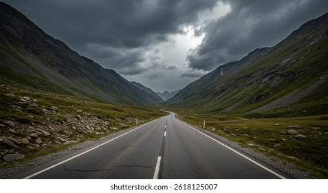 Dramatic storm clouds gather over a winding mountain road through a lush green valley in the Swiss Alps.
