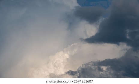 Dramatic storm clouds gathering in a dynamic and moody sky.