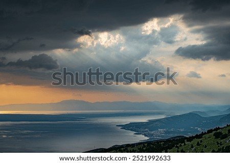Dramatic storm clouds are moving over the Croatian Adriatic coast.