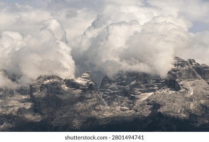 Dramatic Storm Clouds Over Rugged Dolomite Peaks in the Italian Alps