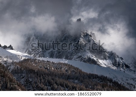 Dramatic Storm Clouds over the Snowy Mountains of Chamonix, France