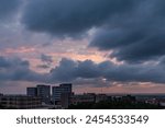 Dramatic storm clouds and pink sunset. Photo was taken before a rainstorm in San Antonio Texas during twilight