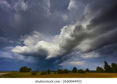 Dramatic storm clouds in the sky, dark severe storm clouds, supercell. Climate change
