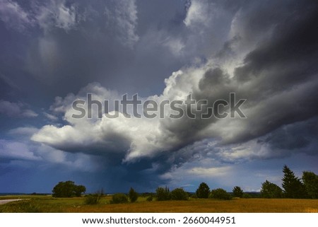 Dramatic storm clouds in the sky, dark severe storm clouds, supercell. Climate change