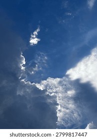 Dramatic Storm Clouds with Sun Rays Breaking Through the Sky