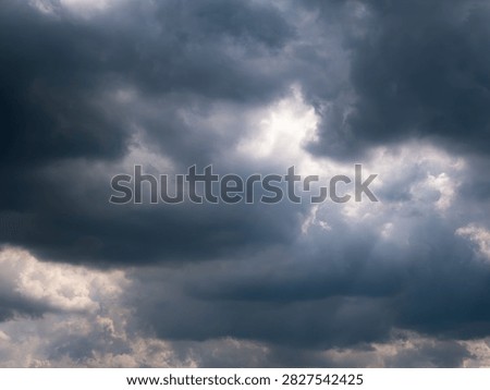 Dramatic Storm Clouds with Sunlight Breaking Through, Moody Sky Background
