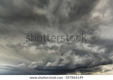 Dramatic storm cloudscape, with strange cloud shapes and rain
