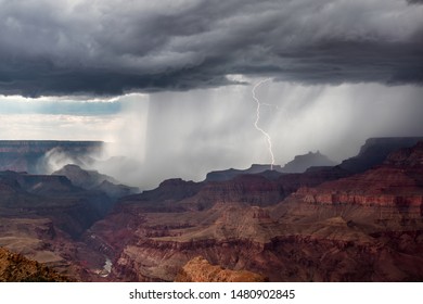 Dramatic storm with lightning and rain over Grand Canyon National Park, Arizona - Powered by Shutterstock - Get 15% off with code: PIKWIZARD15