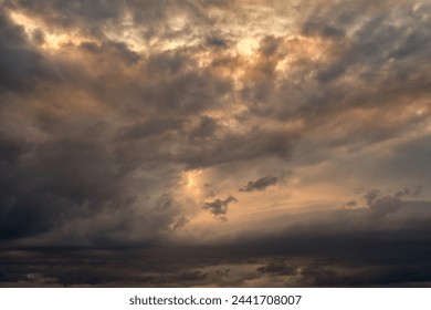 Dramatic storm sunset clouds skies heaven cloudscape background. Natural backgrounds: stormy sky.