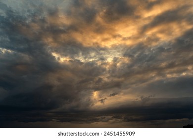 Dramatic storm sunset clouds skies heaven cloudscape background. Natural backgrounds: stormy sky.