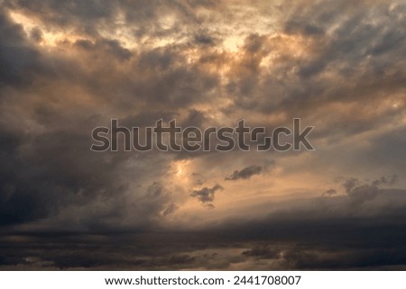 Dramatic storm sunset clouds skies heaven cloudscape background. Natural backgrounds: stormy sky.