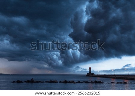 Dramatic stormy clouds over the Duluth lighthouse on Lake Superior