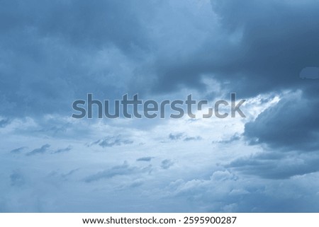 Dramatic Stormy Sky with Dark Clouds and Blue Hues Nature Background