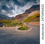 Dramatic summer view of famous Italian pass - Stelvio High Alpine Road, South Tyrol, province of Sondrio. Incredible evening scene of Ortler Alps, Italy, Europe. Traveling concept background.

