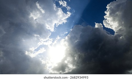 Dramatic Sunlit Cumulus Cloudscape Underneath Deep Blue Sky View - Powered by Shutterstock - Get 15% off with code: PIKWIZARD15