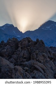 Dramatic Sunrays Peak Over The Sierra Nevada Mountains At Sunset