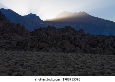 Dramatic Sunrays Peak Over The Sierra Nevada Mountains At Sunset