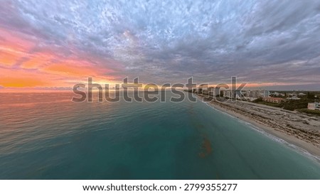 Dramatic Sunrise Aerial View: Juno Beach Coastline, Turquoise Ocean and Oceanfront Condos