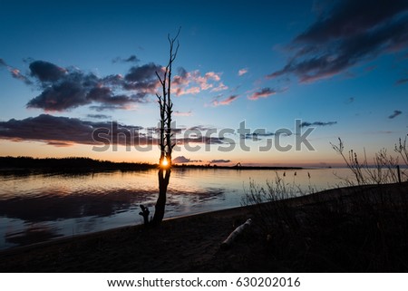 Similar – Image, Stock Photo Sunrise over Ocean Through Black Window Panes