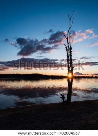 Similar – Image, Stock Photo Sunrise over Ocean Through Black Window Panes