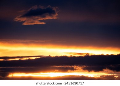 dramatic sunset with black clouds