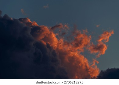 Dramatic sunset clouds against a twilight sky.