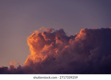 Dramatic sunset clouds against a twilight sky.