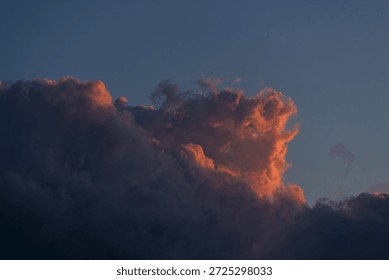 Dramatic sunset clouds against a twilight sky.