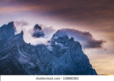 Dramatic Sunset Clouds over the mountain peaks - Grant Tetons