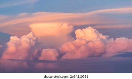 Dramatic sunset clouds with pink and orange hues.